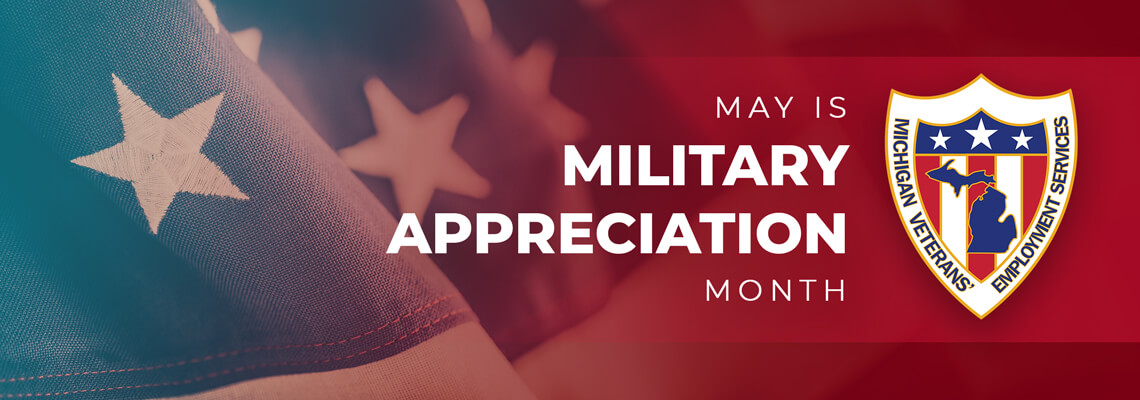 Close-up of a United States flag, featuring the text "May is Military Appreciation Month" and displaying the Veterans' Employment Services shield logo prominently.